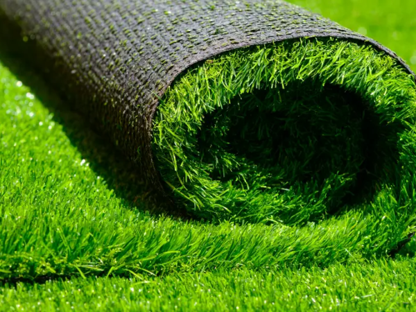 How Can You Style Your Backyard Playground By Using Artificial Grass?